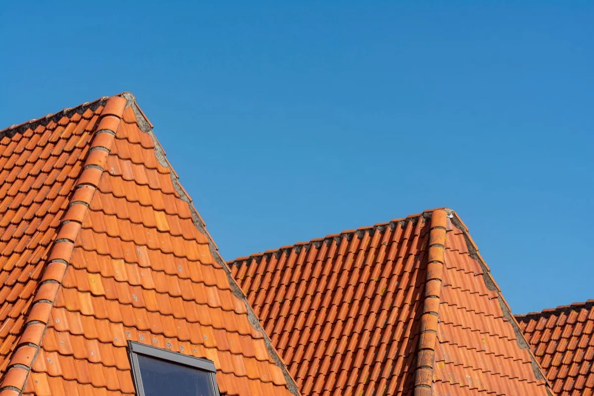 Clay barrel tile rooflines on homes in Hampton, VA