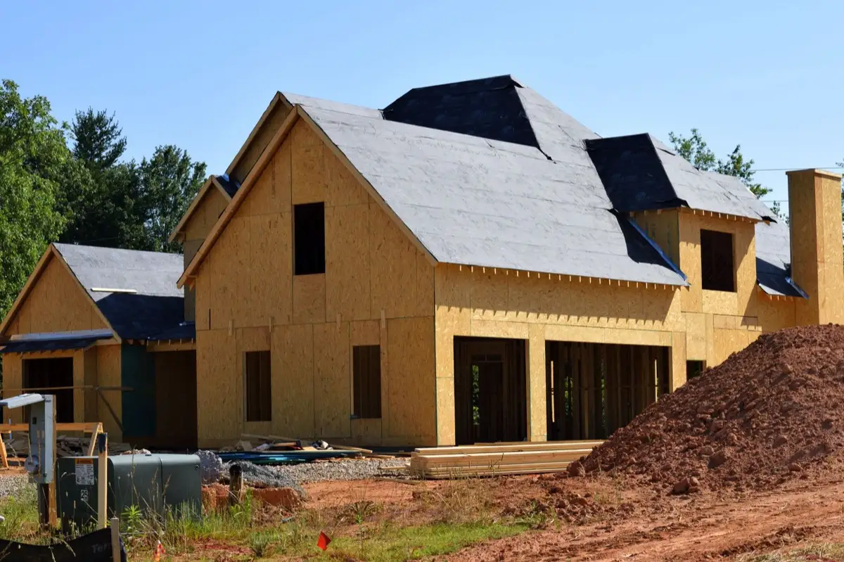 House with new roof decking and synthetic underlayment during a roof replacement in Hampton, VA